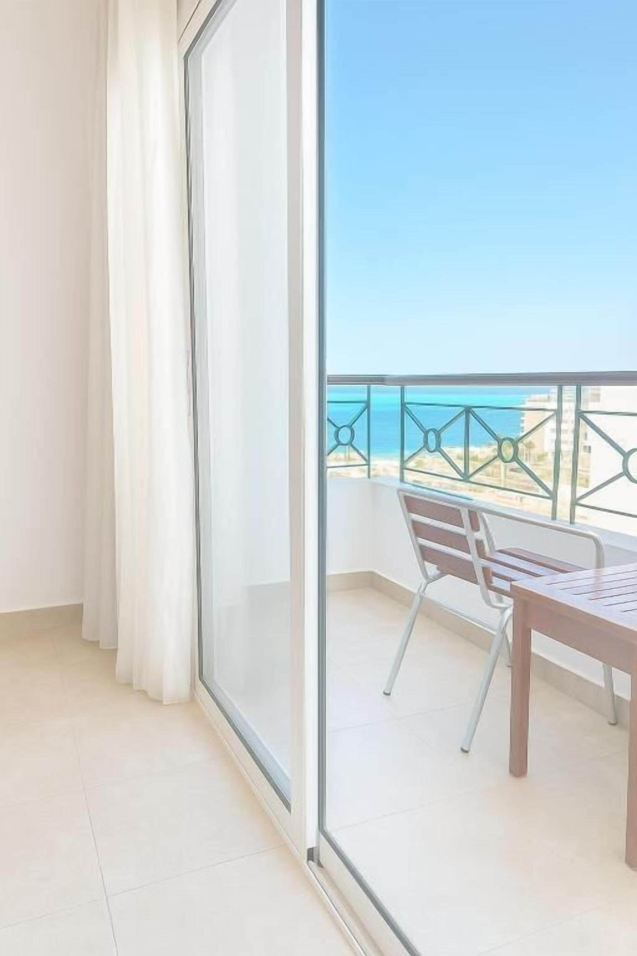 Deluxe Room, Balcony, Sea View | Terrace/patio
