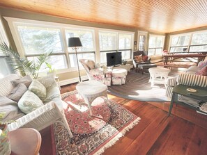 Smart TV, fireplace, DVD player, books