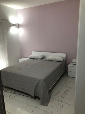 2 habitaciones, tabla de planchar con plancha y wifi gratis 