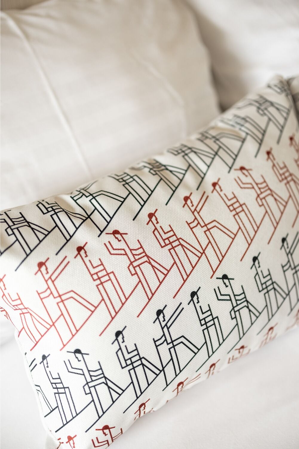 A pillow with a geometric pattern.