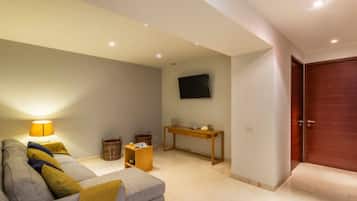 Basic Apartment | Living area | 40-inch flat-screen TV with digital channels, TV