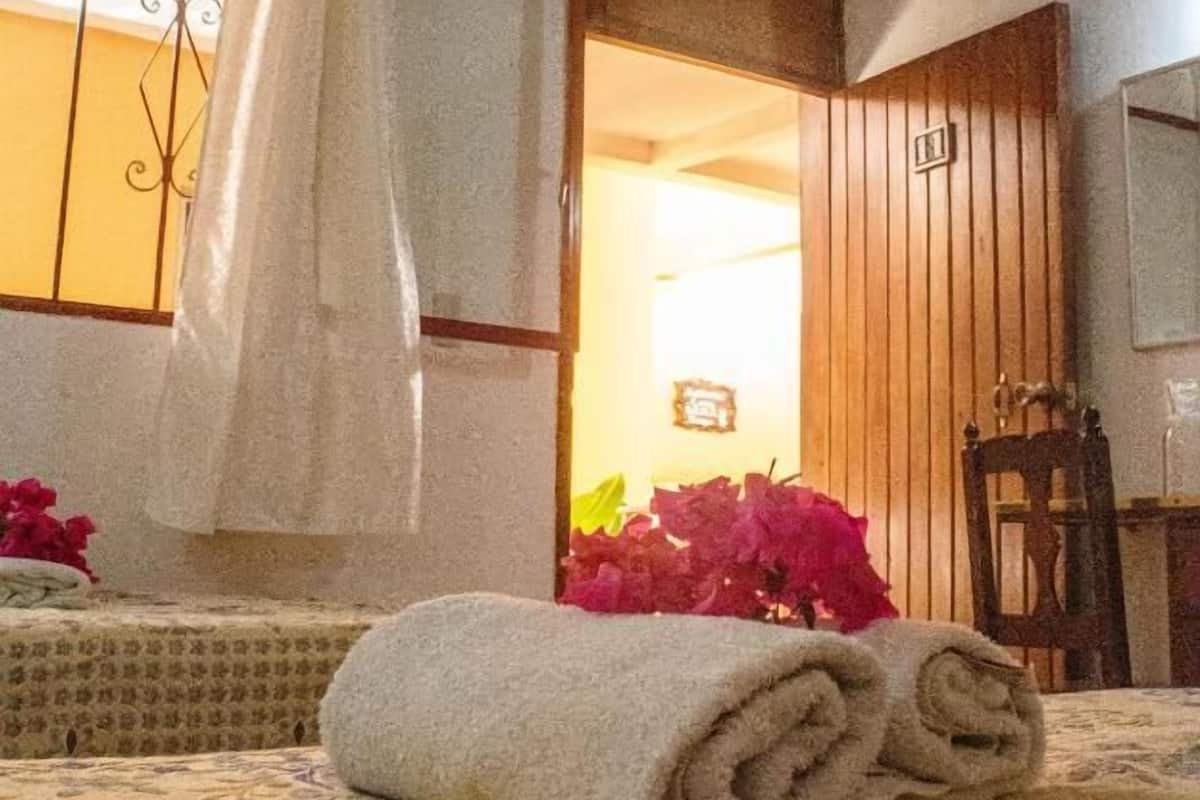 Habitación triple estándar | Ropa de cama
