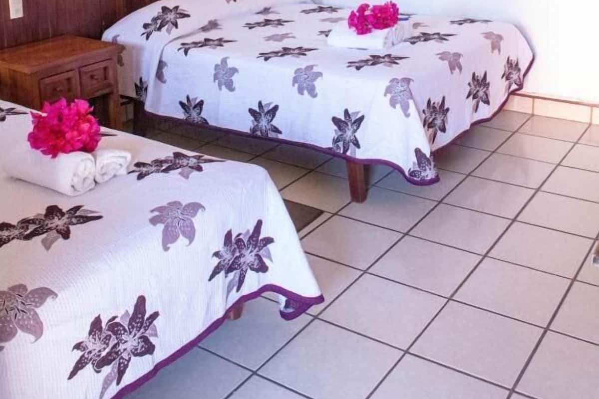 Habitación cuádruple estándar | Ropa de cama 