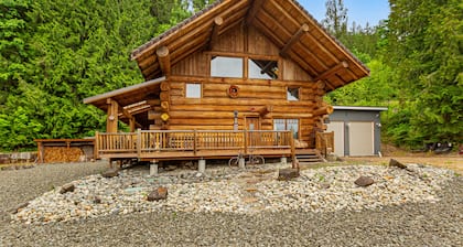 Unique mountain view log home with a wood stove, balcony, patio, & board games