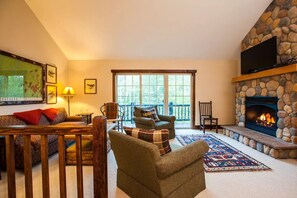 Smart TV, fireplace, books