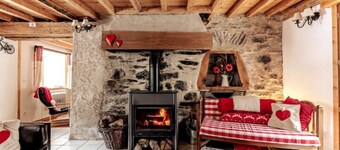 Sleeps 35 across three gites with shared garden and pool in summer