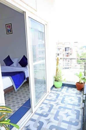 Habitación Deluxe, 1 cama Queen size, vista a la ciudad | Vista del balcón