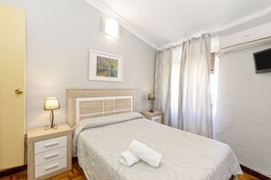 Habitación doble clásica | Wifi gratis y ropa de cama 