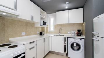 Apartment | Private kitchen | Fridge, microwave, oven, stovetop