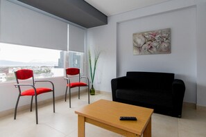 Apartamento | Área de estar | TV