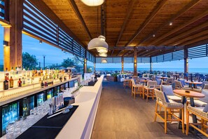 5 bars/lounges, beach bar