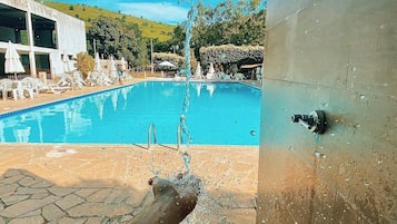 Outdoor pool, open 9:00 AM to 9:00 PM, free pool cabanas, pool loungers