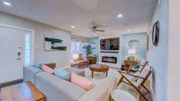 Smart TV, fireplace, books