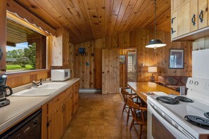 Fridge, microwave, oven, stovetop - Two bedroom log cabin (Ennis)