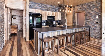 NEW BUILD! Lakefront resort cabin with fireplace, sandy beach, dock, fire pit!