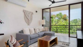 Basic Apartment | Living area | 40-inch flat-screen TV with digital channels, TV