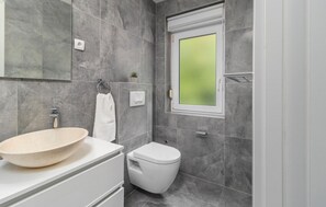 Regadera y secadora de cabello