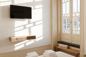 1 غرفة نوم ومكواة/لوح كي وخدمة الإنترنت وملاءات أسرّة