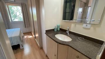Basic Apartment | Bathroom | Free toiletries, towels, soap
