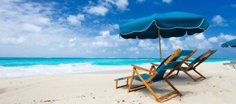 Family friendly with private beach and beach service! NEWLY RENOVATED