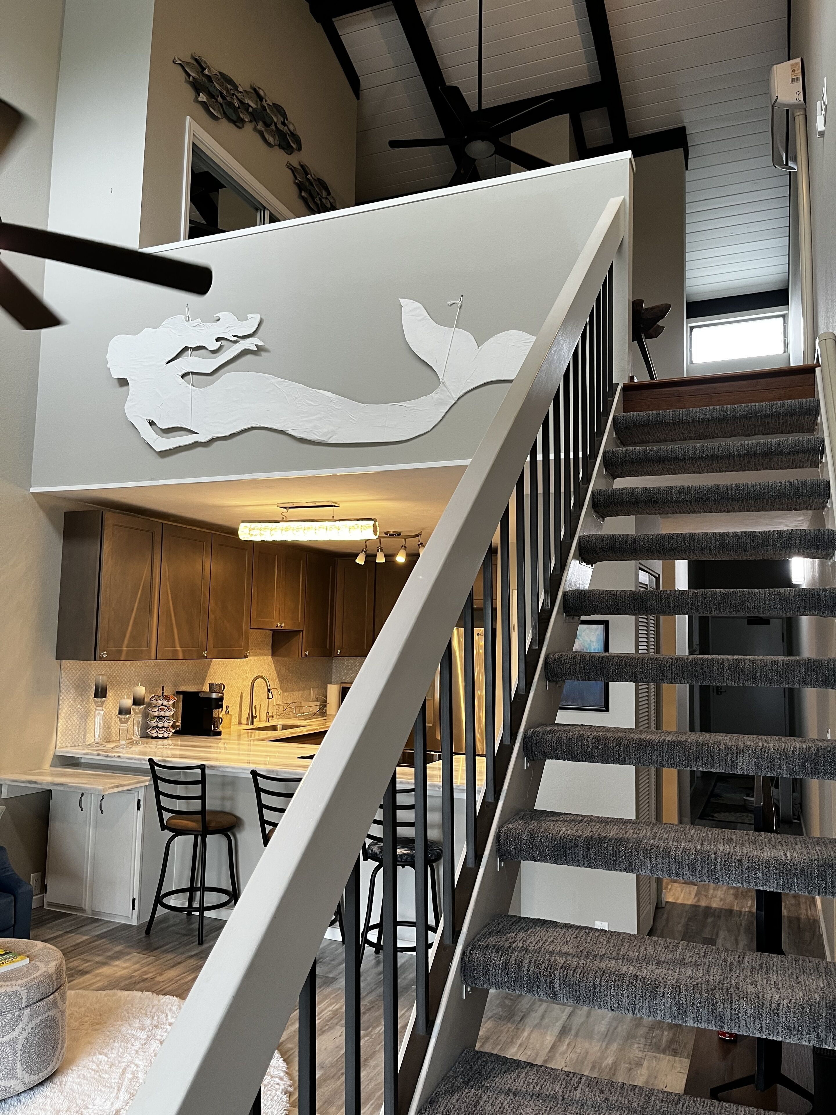 The Mermaid Loft. Walk to restaurants, shops, the beach and the Ironman course.