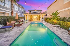 A heated pool - Amped at Reunion | 4BR Home w Private Pool, Theater, Themed Kids' Room, and Arcade Near Disney (Kissimmee)