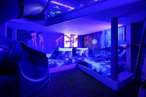 4 bedrooms, iron/ironing board, WiFi, bed sheets - Amped at Reunion | 4BR Home w Private Pool, Theater, Themed Kids' Room, and Arcade Near Disney (Kissimmee)