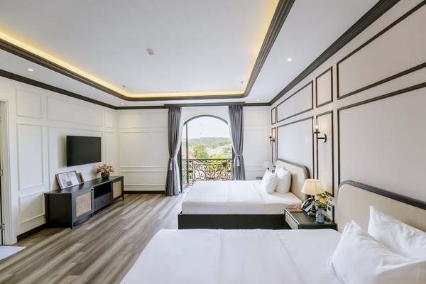 Habitación Premium | Ropa de cama de alta calidad y artículos del minibar gratis