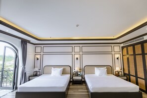 Habitació prèmium | Roba de llit d'alta qualitat i minibar gratuït