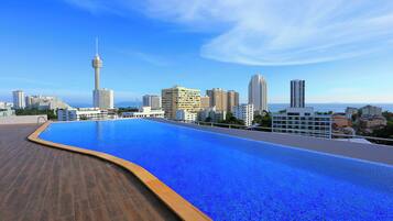 Outdoor pool, open 7:00 AM to 8:00 PM, pool umbrellas, sun loungers