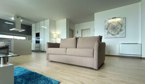 Royal Apartment, 3 Bedroom, Patio, Ocean View | Living area | 50-inch flat-screen TV with cable channels, TV - Silverside Holidays (Caldas da Rainha)