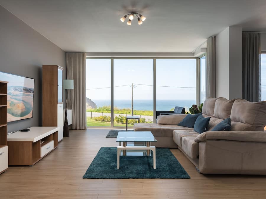 Royal Apartment, 3 Bedroom, Patio, Ocean View | Living area | 50-inch flat-screen TV with cable channels, TV