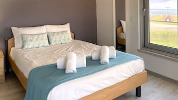 Royal Apartment, 3 Bedroom, Patio, Ocean View | 2 bedrooms, in-room safe, desk, laptop workspace
