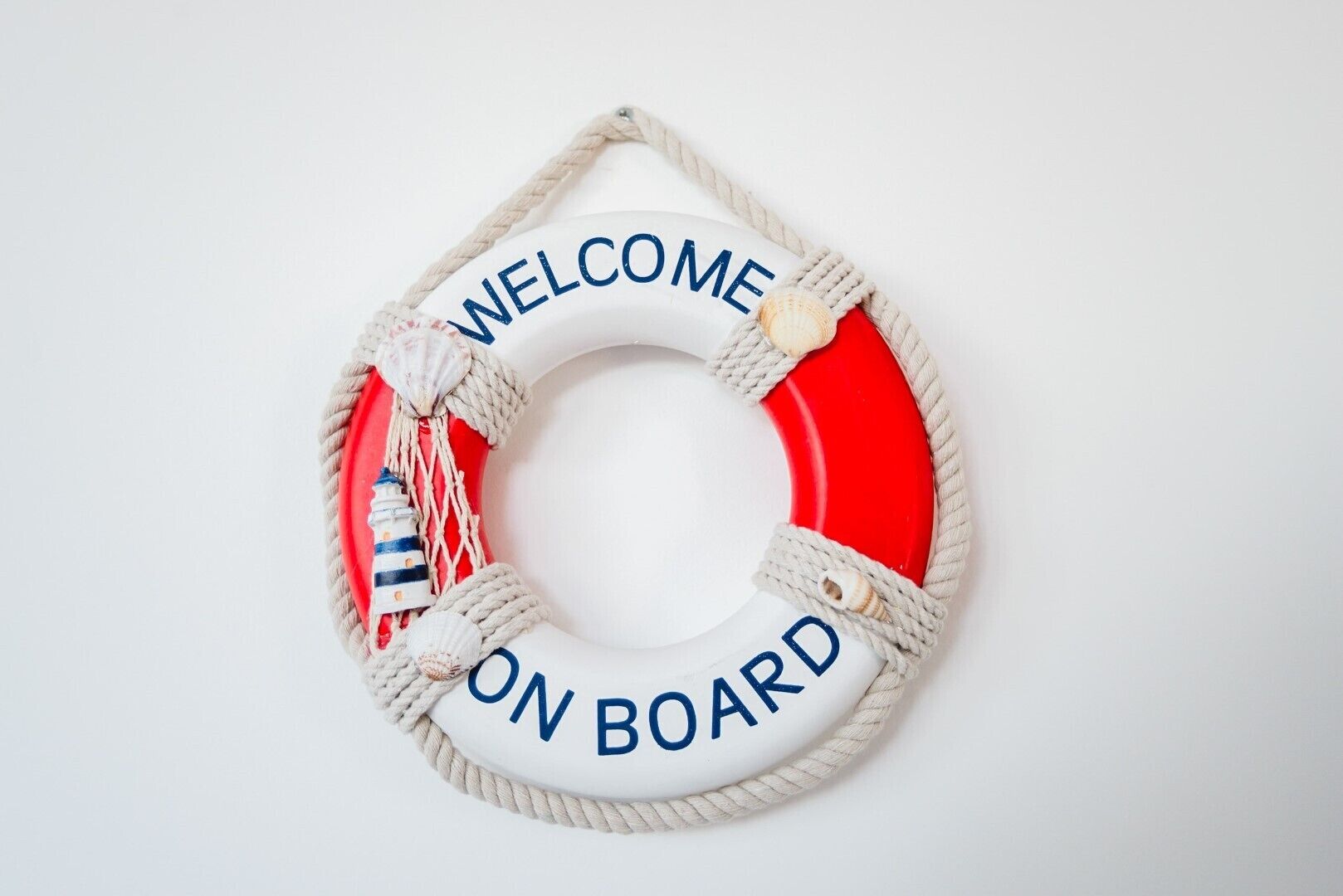 A lifebuoy with 'WELCOME ON BOARD' text.