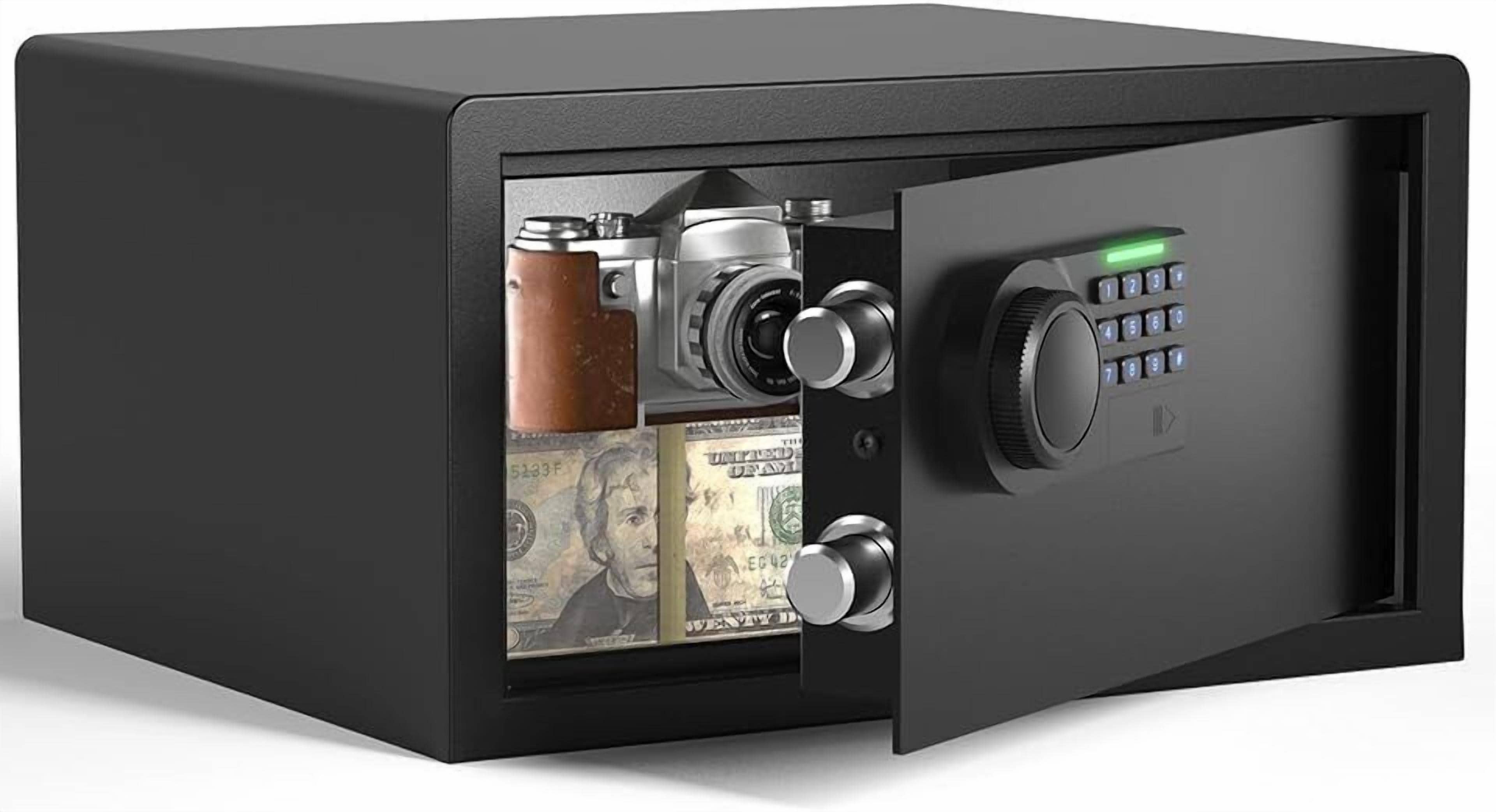 A safe with a combination lock and a keypad, containing a camera and a stack of cash.