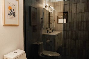 Shower, hair dryer, towels, soap