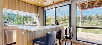 Secluded unique home in prime location with deck, woodstove, & mountain view