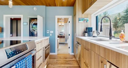 Secluded unique home in prime location with deck, woodstove, & mountain view