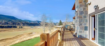 Luxe home on Gypsum Creek Golf Course with fireplace and mountain views