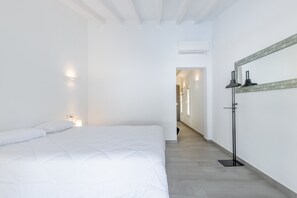 2 dormitorios, tabla de planchar con plancha, wifi gratis y ropa de cama