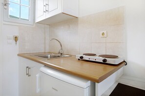 Fridge, stovetop, cookware/dishes/utensils