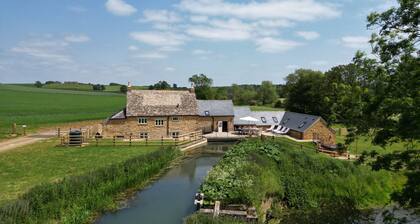 16th century converted mill in the Cotswolds with a hot tub -Little Barford Mill