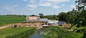 16th century converted mill in the Cotswolds with a hot tub -Little Barford Mill