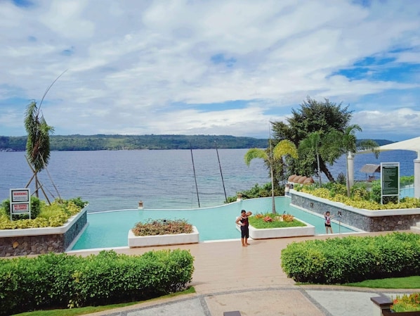 Outdoor pool - Bali inspired resort with condo (Island Garden City of Samal)