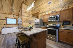 Fridge, microwave, oven, stovetop - Moonlit Oaks Retreat | Romantic Broken Bow Cabin with Hot Tub, Fire Pit & Fireplace (Broken Bow)