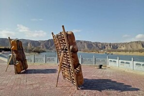 Unclassified image, 4 of 16, button - Yellow River Stone Forest Red Apple Ecological Garden Restaurant (Jingtai)