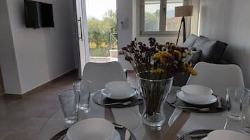 Family Duplex | Living area | Flat-screen TV