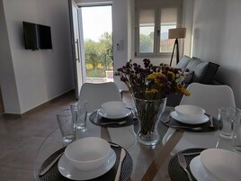 Dúplex familiar | Zona de estar | Una televisión de pantalla plana