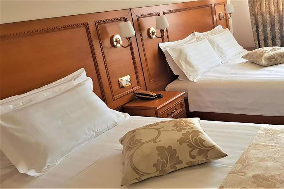 家庭客房 | 義大利 Frette 床單、高級寢具、羽絨被、記憶床墊