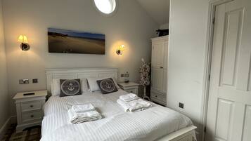 4 slaapkamers, een strijkplank/strijkijzer, gratis wifi, beddengoed